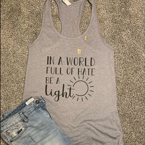 In a world full of hate be a light shirt
